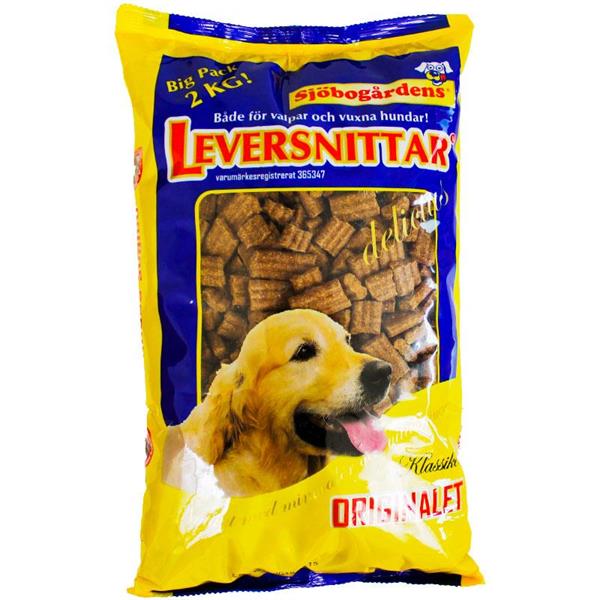 Gul påse med hundgodis med foto av en golden retriever och text på svenska.