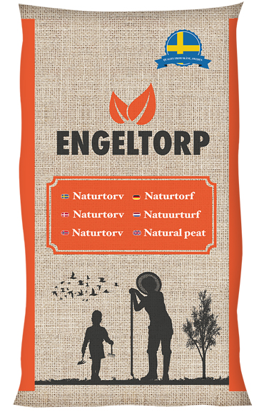 En påse i juteväv märkt Engeltorp med silhuetter av en person, ett barn och ett träd.