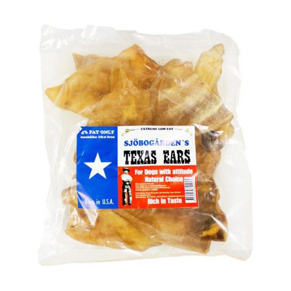 En genomskinlig påse med Sjöbogården texas öron 9p, UTGÅNGET DATUM, -25%, med en röd och blå etikett.