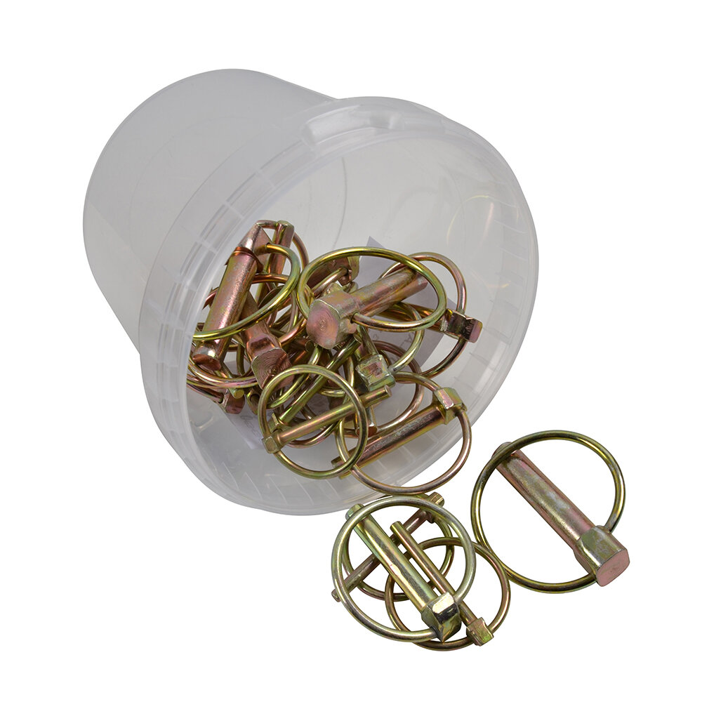 Ett kärl med "Sortiment av ringsprintar 30st/fp" med två nålar utanför behållaren.