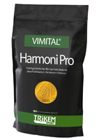 Svart väska av märket VIMITAL Harmoni Pro med ett guldemblem på framsidan.