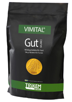 Svart påse märkt Trikem Gut Balance 1000g, med en guldförsegling på framsidan.