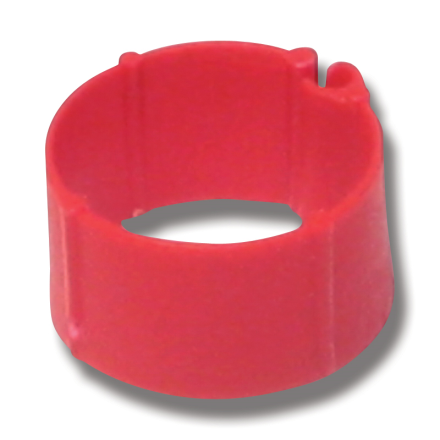 Röd plastring med en liten skåra, mot en vit bakgrund med en skugga.