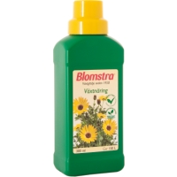 En grön 300 ml VÄXTNÄRING BLOMSTRA-flaska med gult lock och blometikett.