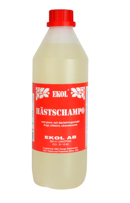 En 1L plastflaska märkt Ekol hästschampo med röd och vit märkning.