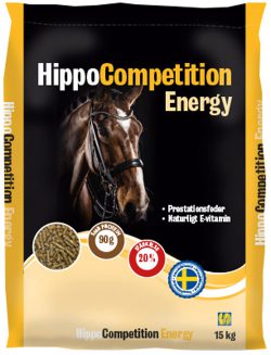 HippoCompetition Energy 15 kg hästfoderpåse med hästbild, gul och vit text.