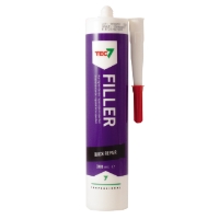 Vitt munstycke, rött lock SNABB SPACKEL FILLER VIT 300ML i en lila tub.