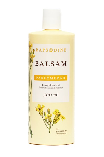 Gul 500ml Rapsordine Balsam flaska med blommig design och svensk text på etiketten.