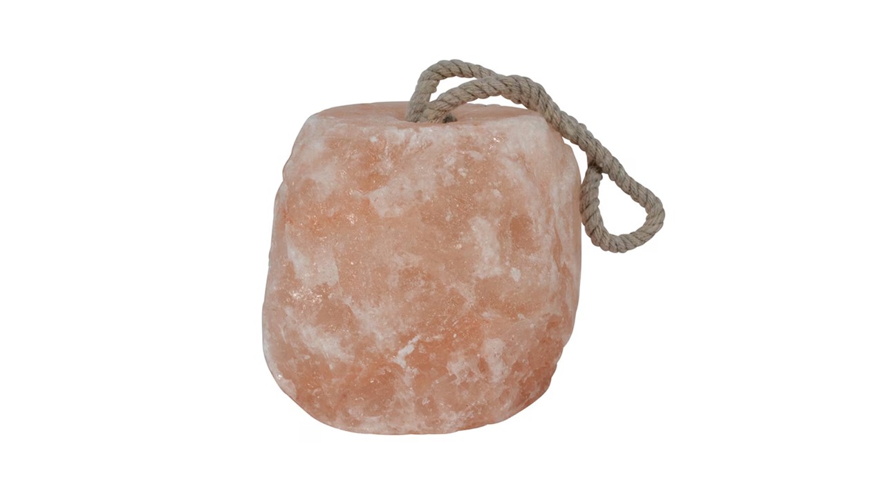 Saltsten Himalaya rosa saltsticka med rephandtag mot en vit bakgrund.