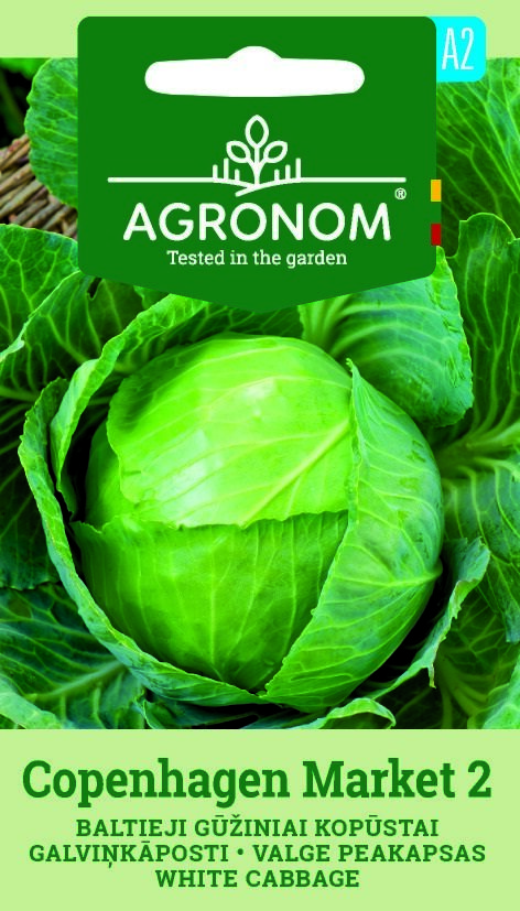 En närbild av en färsk grönkål med information om fröförpackningen för Cabbage White Copenhagen.