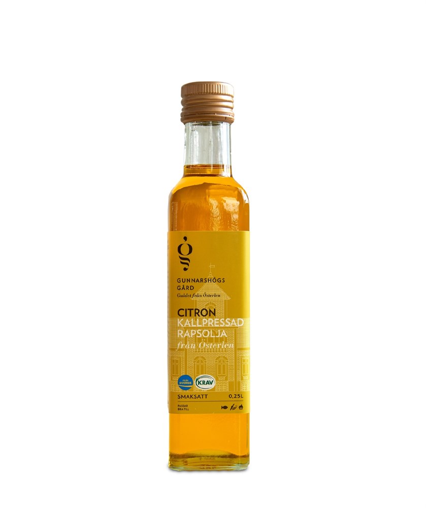 En flaska Rapsolja Citron KRAV 0,25 L med en gul etikett.