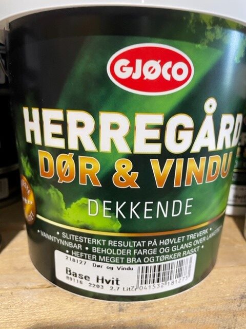 En färgburk märkt Dörr och fönster bas vit 2,7Liter.