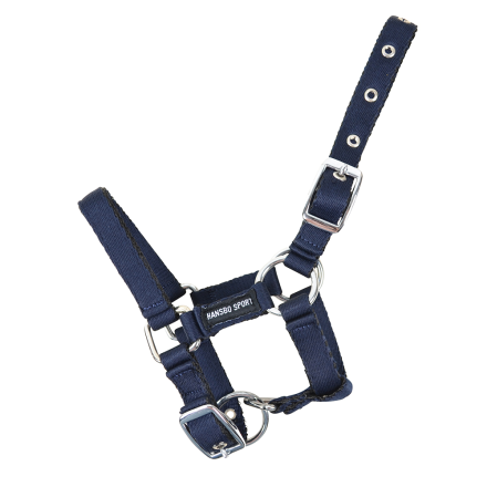 FÖLGRIMMA CUSHION FULL MARIN: marinblå grimma med metallspännen, justerbara remmar.