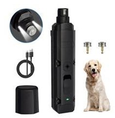 Kloslip nagelslipssats för husdjur med USB-kabel, extra huvuden och en golden retriever i närheten.