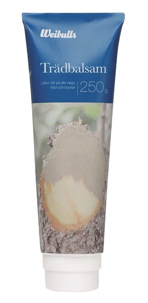 Blåvitt Weibull Trädbalsamrör med en bild av en trädskada på framsidan.