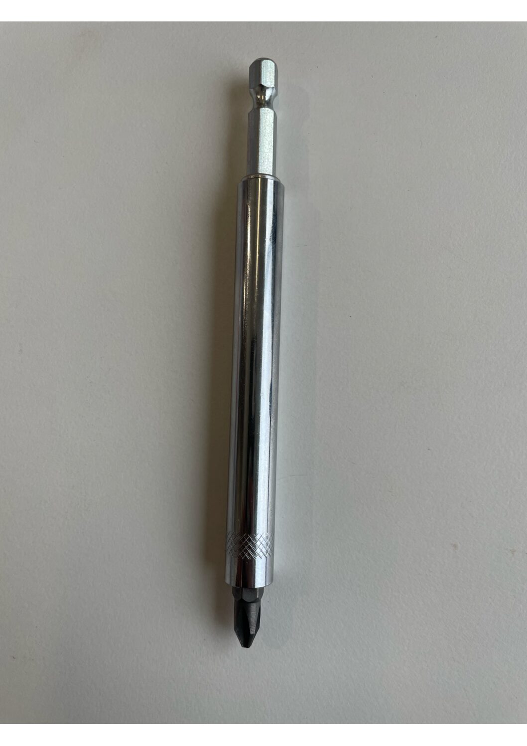 Wemax bitshållare med styrhylsa 110mm på en ljusgrå yta.