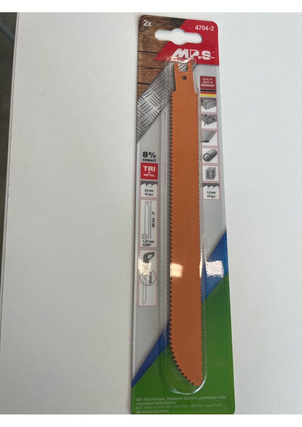 Två Tigersågsblad metal & trä 8%cobalt universalblad i plastförpackning på vit botten.