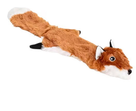 Korris: Plymig, platt rävformad hundleksak utan stoppning på vit bakgrund.