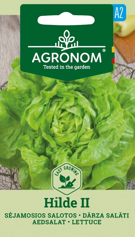 Ett paket Sallat, Hilde II-frön med ett foto av grön sallat på förpackningen.