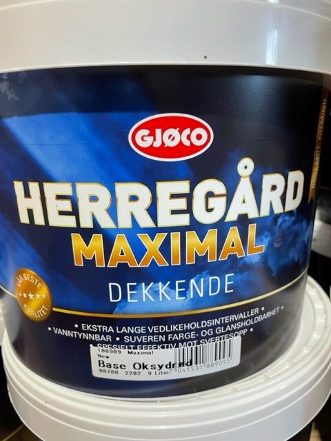 En färghink märkt Maximal base oxidröd 9LITER med blå och guldfärgad text.