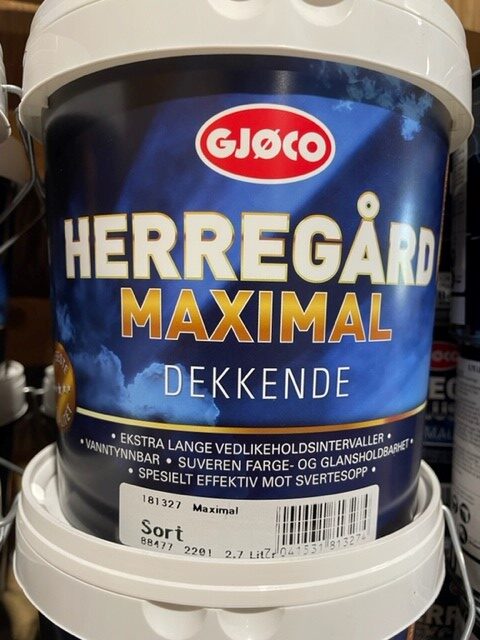 En 2,7 l Maximal sort f&auml;rgburk fr&aring;n GJ&Oslash;CO p&aring; en butikshylla.