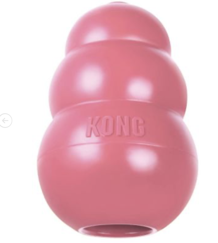 Kong puppy S toy i gummi, rosa, med tre rundade delar och ett hål vid basen.