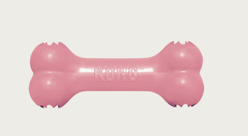 Rosa Kong Goodie Bone Puppy S leksak med logotyp präglad i mitten.