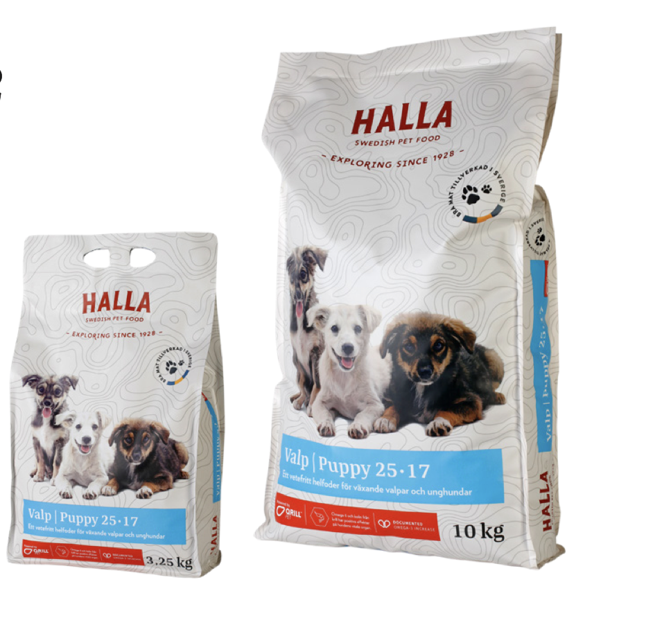 Två påsar med torrfoder för hundar av märket Halla puppy med bilder av tre valpar på framsidan.