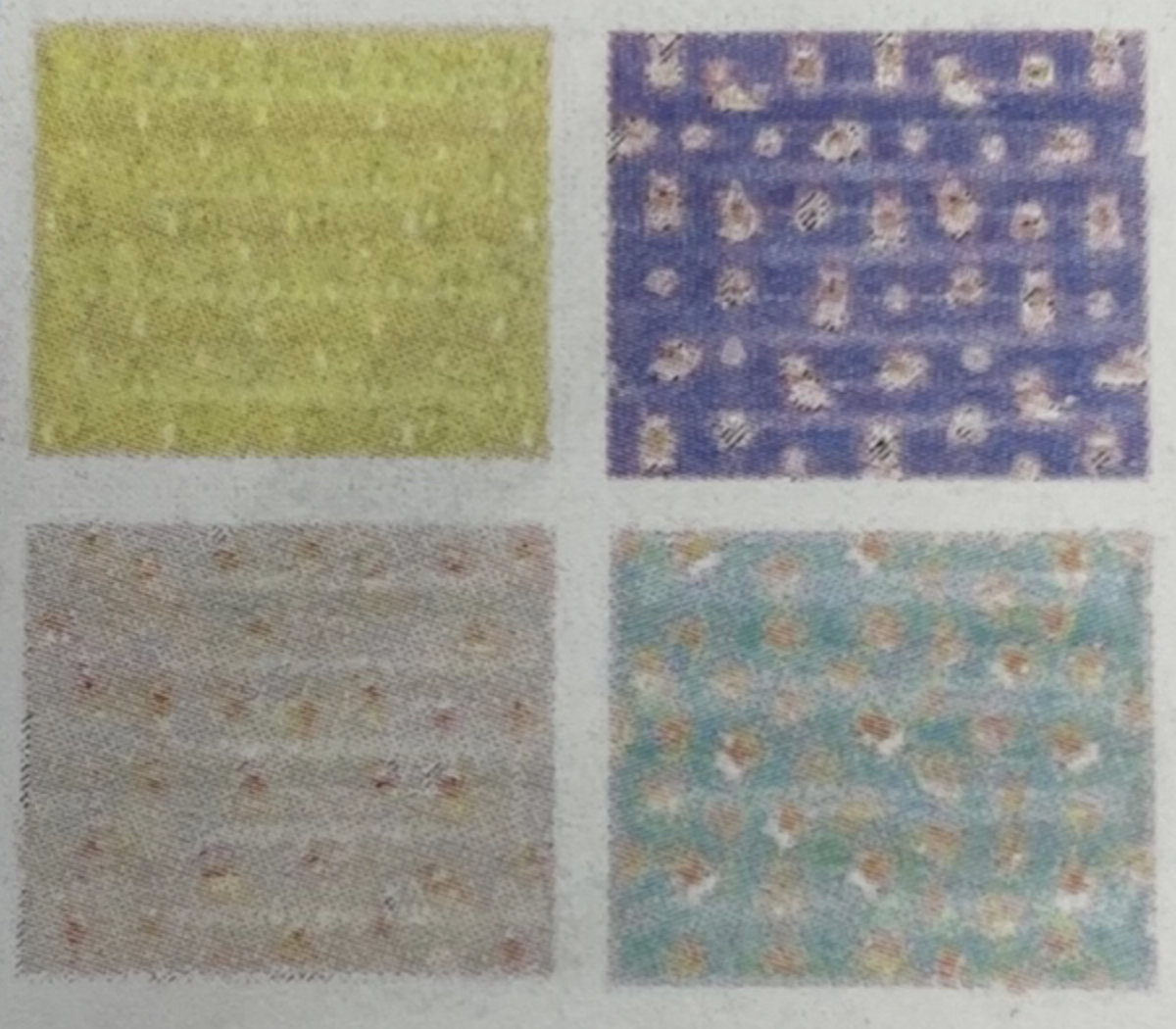 Fyra Kyldyna-rutor med små, utspridda prickar och unika mönster på varje ruta.