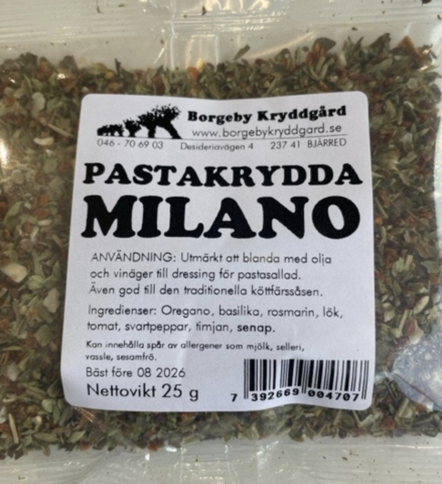 Ett 25 g paket PASTAKRYDDA MILANO med ingredienser och användning på svenska.
