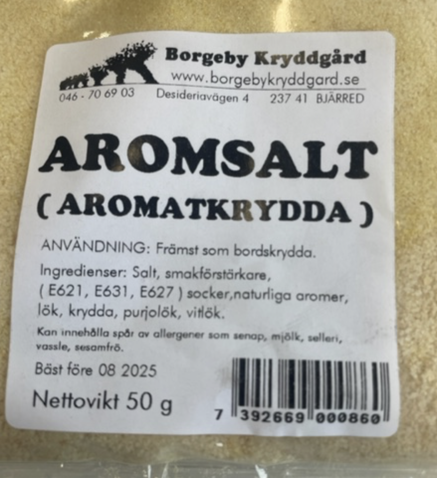 En 50 g förpackning med AROMSALT (AROMATKRYDDA) med svensk ingrediens- och användningsinformation.