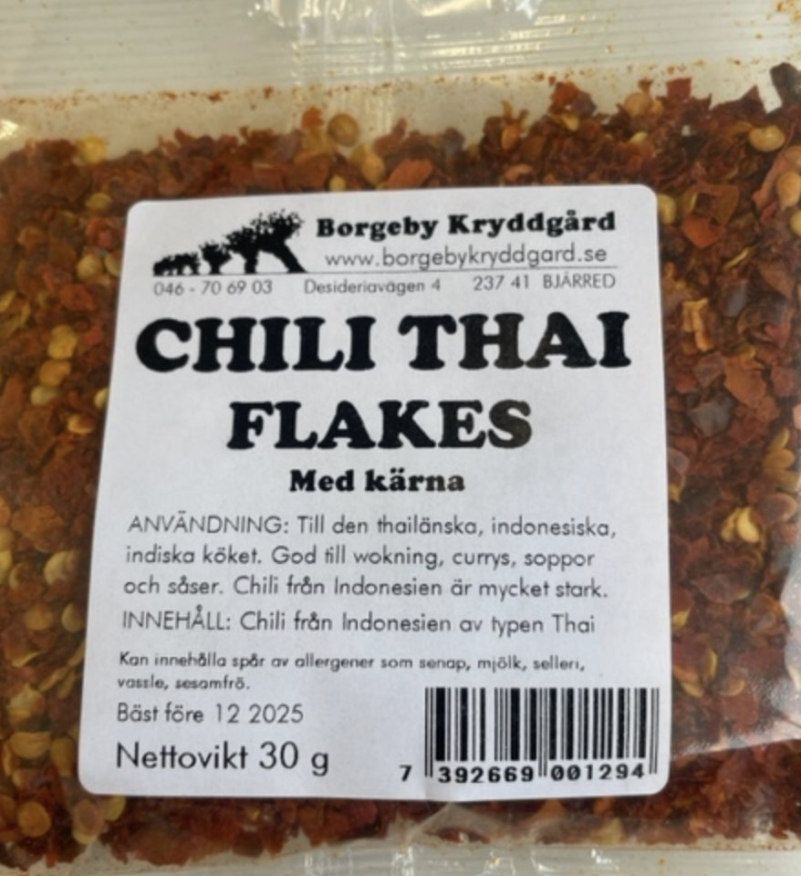 En 30 g förpackning CHILI THAI FLAKES MED KÄRNA.
