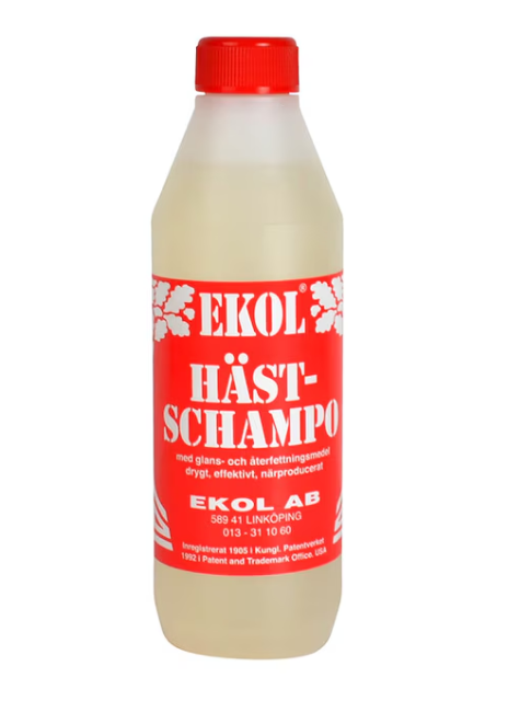 En flaska Ekol Hästschampo med en röd och vit etikett.