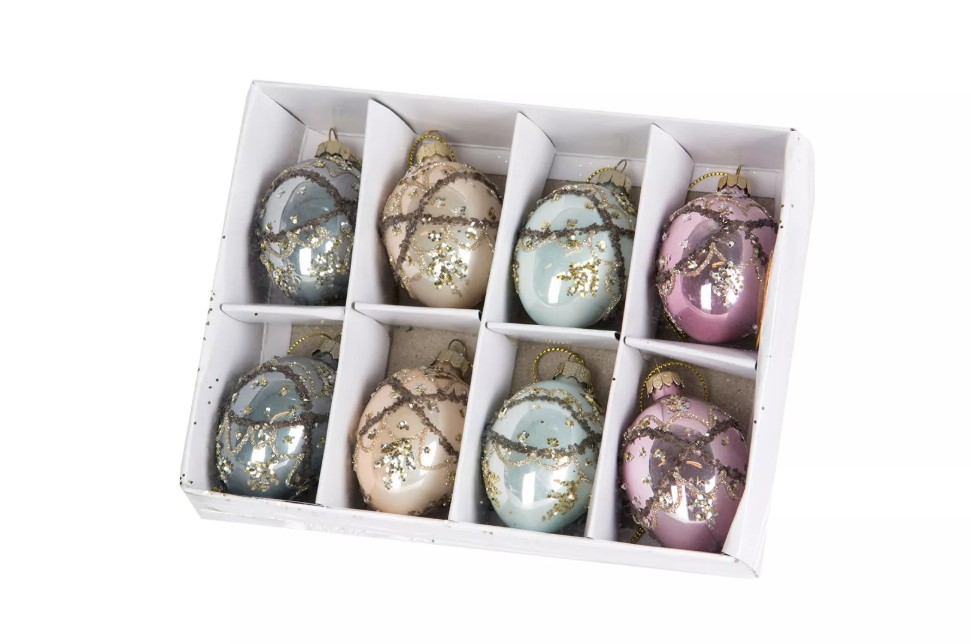 Låda med åtta färgglada Ägg-ornament i kungligt glas, olika glittriga pasteller.