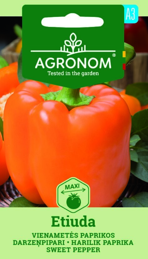 Orange paprika med grön stjälk på fröförpackning märkt Sweet Pepper, Etiuda.