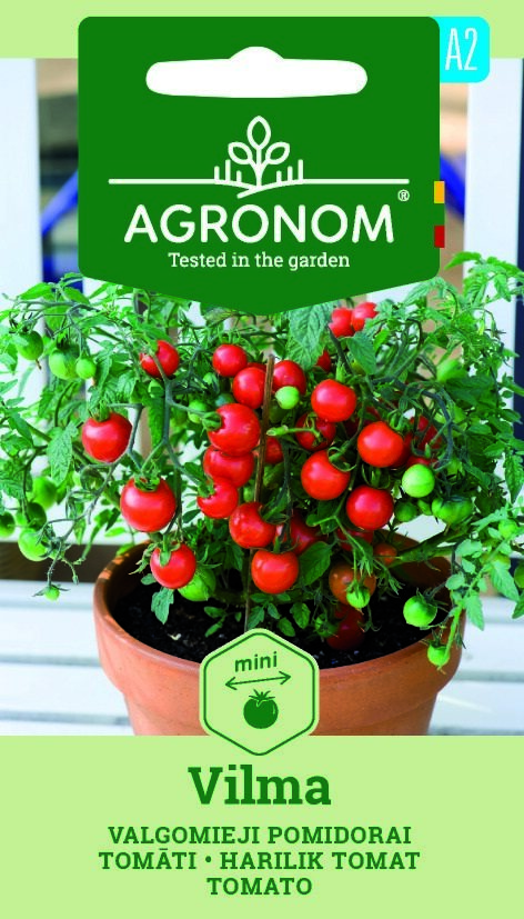 På ett fröpaket märkt Tomat, Vilma syns en krukväxt med små, mogna röda tomater.
