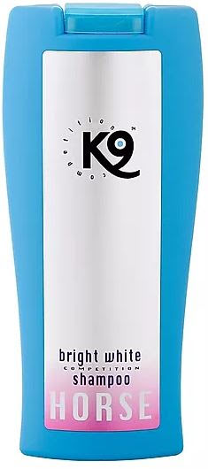 Blå flaska BRIGHT WHITE SCHAMPOO med vit och rosa etikett.