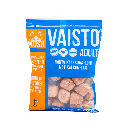 En blå och orange påse med MUSH Vaisto Adult frysta köttbullar av rå hundmat.