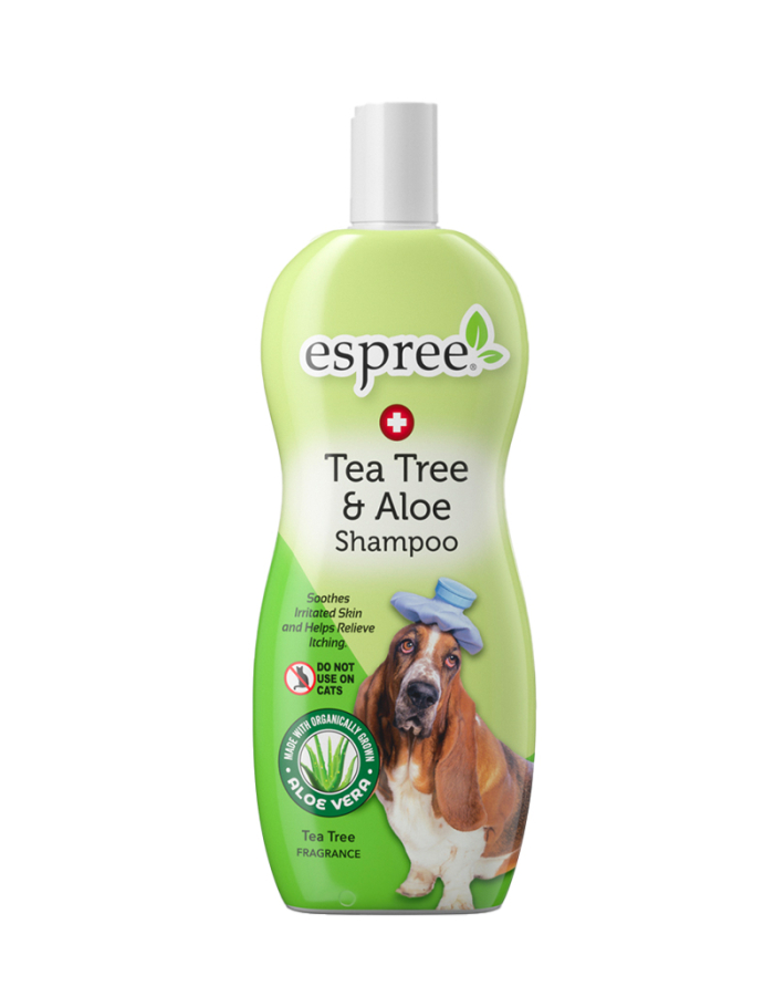 Grön flaska med Tea Tree & Aloe Shampoo med en Basset Hound på etiketten.