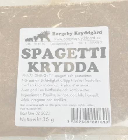 SPAGETTIKRYDDA (35 g) förpackning med svensk etikett som visar ingredienser och instruktioner.